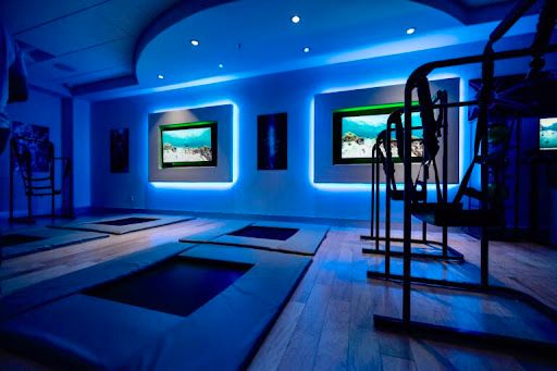 Main room with cognitive training equipment and displays